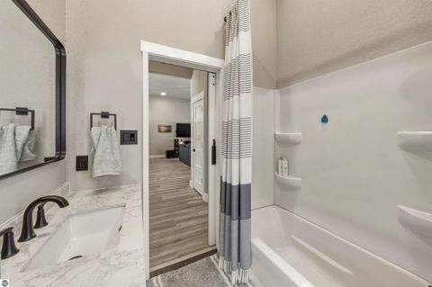 Tiny photo for 7980 Springwater Drive, Rapid City, MI 49676 (MLS # 1944438)