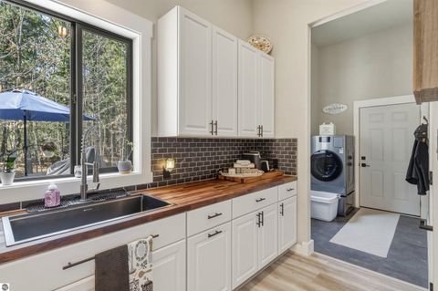 Tiny photo for 7980 Springwater Drive, Rapid City, MI 49676 (MLS # 1944438)