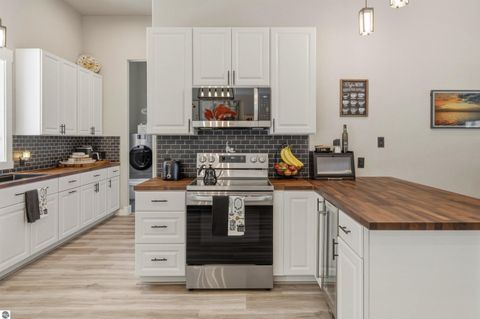 Tiny photo for 7980 Springwater Drive, Rapid City, MI 49676 (MLS # 1944438)
