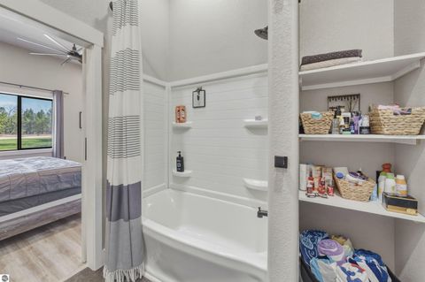 Tiny photo for 7980 Springwater Drive, Rapid City, MI 49676 (MLS # 1944438)