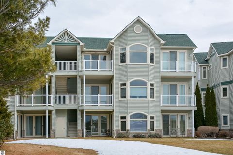 Tiny photo for 110 Ames Street #13, Elk Rapids, MI 49629 (MLS # 1942995)