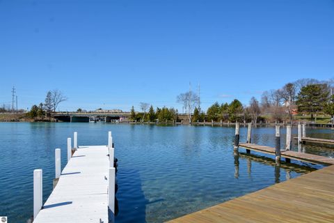 Tiny photo for 110 Ames Street #13, Elk Rapids, MI 49629 (MLS # 1942995)