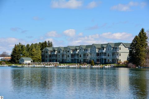 Tiny photo for 110 Ames Street #13, Elk Rapids, MI 49629 (MLS # 1942995)