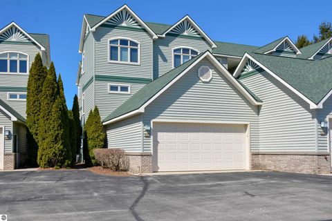 Tiny photo for 110 Ames Street #13, Elk Rapids, MI 49629 (MLS # 1942995)