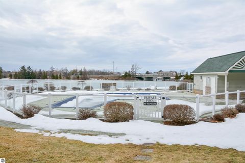 Tiny photo for 110 Ames Street #13, Elk Rapids, MI 49629 (MLS # 1942995)