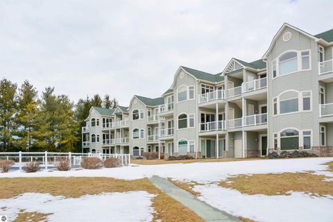 Tiny photo for 110 Ames Street #13, Elk Rapids, MI 49629 (MLS # 1942995)