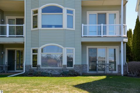 Tiny photo for 110 Ames Street #13, Elk Rapids, MI 49629 (MLS # 1942995)