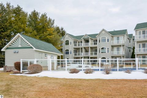 Tiny photo for 110 Ames Street #13, Elk Rapids, MI 49629 (MLS # 1942995)