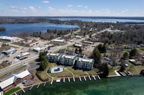 Tiny photo for 110 Ames Street #13, Elk Rapids, MI 49629 (MLS # 1942995)