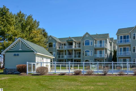 Tiny photo for 110 Ames Street #13, Elk Rapids, MI 49629 (MLS # 1942995)
