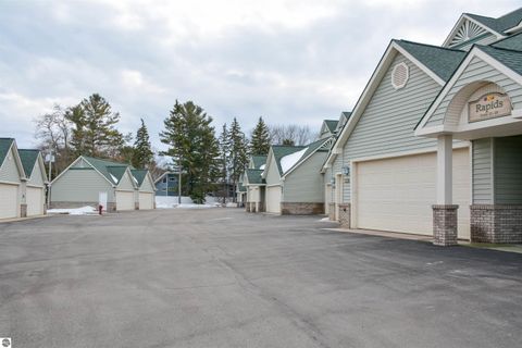 Tiny photo for 110 Ames Street #13, Elk Rapids, MI 49629 (MLS # 1942995)