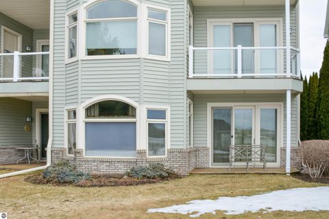 Tiny photo for 110 Ames Street #13, Elk Rapids, MI 49629 (MLS # 1942995)