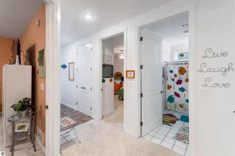 Tiny photo for 110 Ames Street #13, Elk Rapids, MI 49629 (MLS # 1942995)