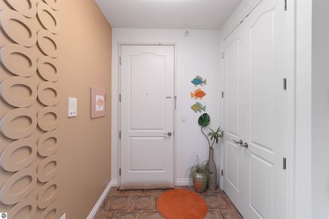 Tiny photo for 110 Ames Street #13, Elk Rapids, MI 49629 (MLS # 1942995)