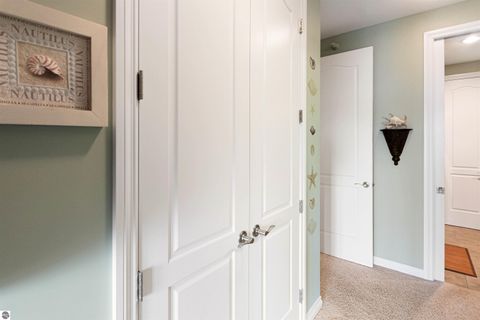 Tiny photo for 110 Ames Street #13, Elk Rapids, MI 49629 (MLS # 1942995)