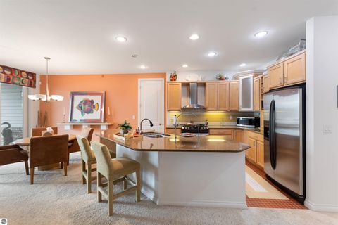 Tiny photo for 110 Ames Street #13, Elk Rapids, MI 49629 (MLS # 1942995)