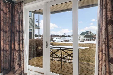 Tiny photo for 110 Ames Street #13, Elk Rapids, MI 49629 (MLS # 1942995)