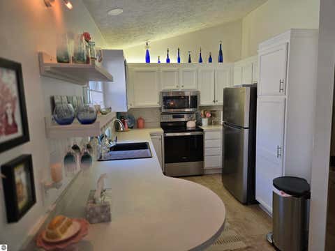 Tiny photo for 1178 Hemingway Lane #65, Traverse City, MI 49686 (MLS # 1947924)