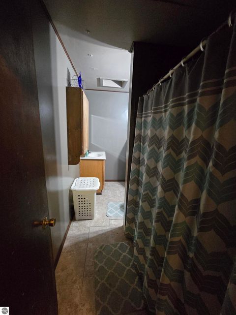 Tiny photo for 6439 Tecumseh Avenue, Oscoda, MI 48750 (MLS # 1941862)