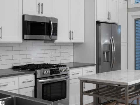 Tiny photo for 8906 Manhattan North #B, Traverse City, MI 49685 (MLS # 1941820)