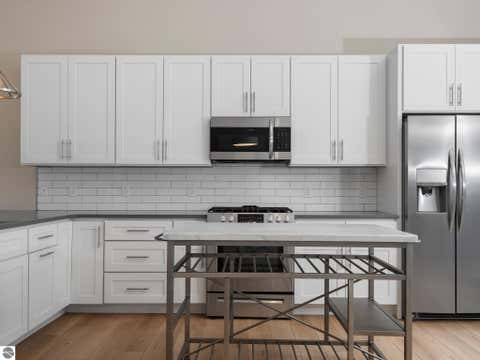 Tiny photo for 8906 Manhattan North #B, Traverse City, MI 49685 (MLS # 1941820)