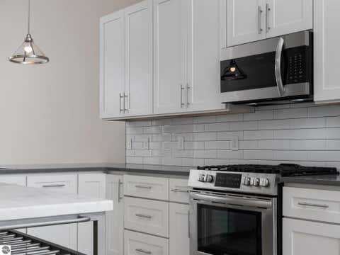 Tiny photo for 8906 Manhattan North #B, Traverse City, MI 49685 (MLS # 1941820)