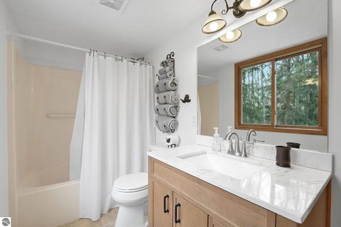 Tiny photo for 4215 Michigan Trail, Kewadin, MI 49648 (MLS # 1944618)