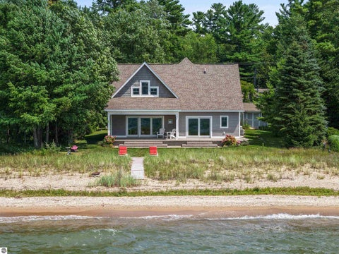Photo of 6557 Deepwater Point Road, Williamsburg, MI 49690 (MLS # 1951046)