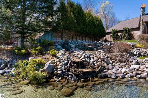 Tiny photo for 1165 N West Torch Lake Drive, Kewadin, MI 49648 (MLS # 1944658)