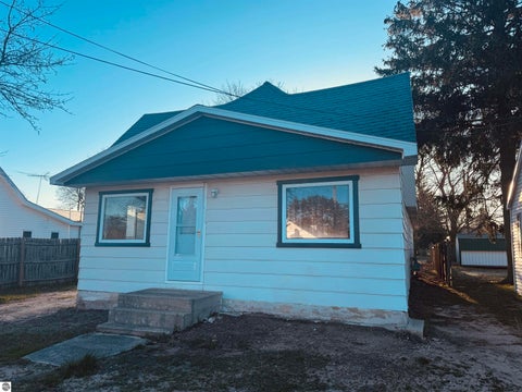 Photo of 408 N Michigan Avenue, Manton, MI 49663 (MLS # 1941722)
