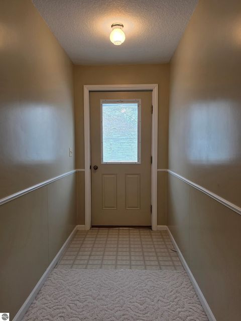 Tiny photo for 308 Locke Street, East Tawas, MI 48730 (MLS # 1941775)