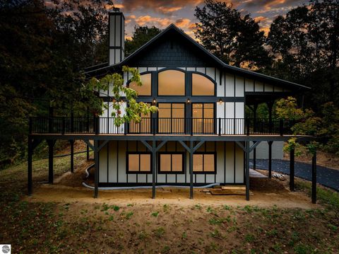 Photo of 4099 S Sugar Loaf Mountain Road, Cedar, MI 49621 (MLS # 1944571)