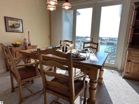 Tiny photo for 11012 Ames Street #12, Elk Rapids, MI 49629 (MLS # 1944167)