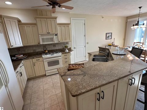 Tiny photo for 11012 Ames Street #12, Elk Rapids, MI 49629 (MLS # 1944167)