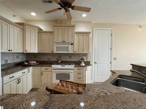 Tiny photo for 11012 Ames Street #12, Elk Rapids, MI 49629 (MLS # 1944167)