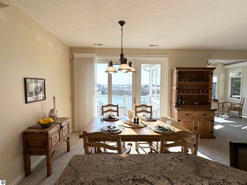 Tiny photo for 11012 Ames Street #12, Elk Rapids, MI 49629 (MLS # 1944167)