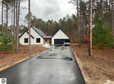 Photo of 1689 Cascade Trail, Traverse City, MI 49685 (MLS # 1941684)