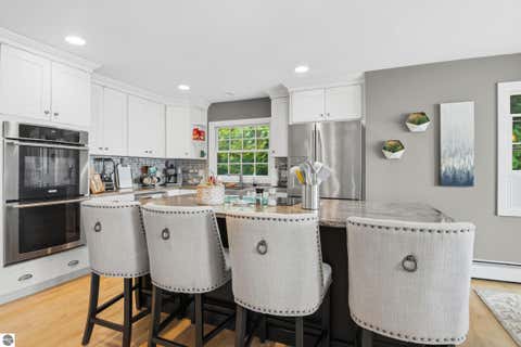 Tiny photo for 705 S Nanagosa Trail, Suttons Bay, MI 49682 (MLS # 1948458)
