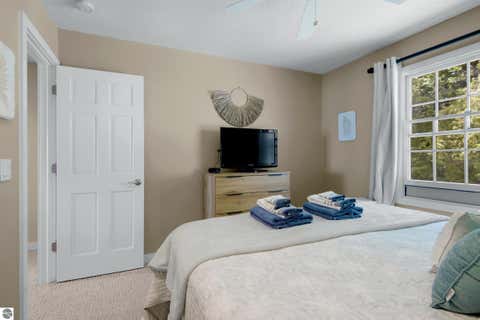 Tiny photo for 705 S Nanagosa Trail, Suttons Bay, MI 49682 (MLS # 1948458)