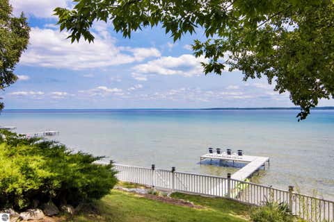 Tiny photo for 705 S Nanagosa Trail, Suttons Bay, MI 49682 (MLS # 1948458)