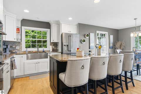 Tiny photo for 705 S Nanagosa Trail, Suttons Bay, MI 49682 (MLS # 1948458)