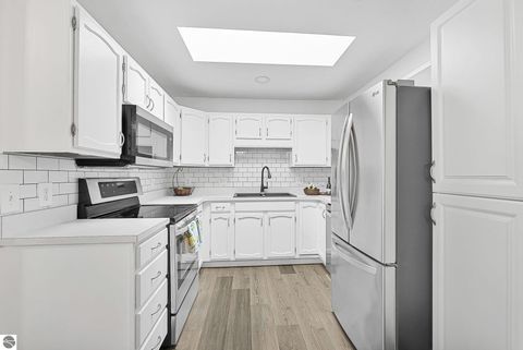 Tiny photo for 2130 E Hammond Place #82, Traverse City, MI 49686 (MLS # 1944925)