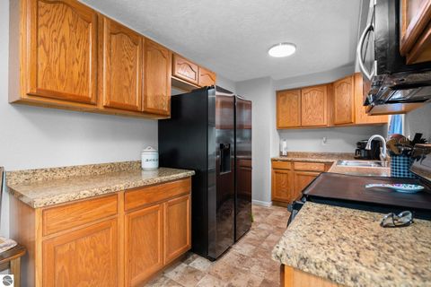 Tiny photo for 814 Maple Street, East Jordan, MI 49727 (MLS # 1943891)