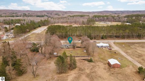 Photo of 814 Maple Street, East Jordan, MI 49727 (MLS # 1943891)