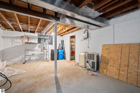 Tiny photo for 814 Maple Street, East Jordan, MI 49727 (MLS # 1943891)