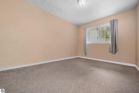 Tiny photo for 814 Maple Street, East Jordan, MI 49727 (MLS # 1943891)