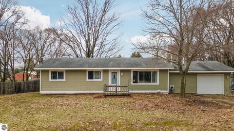 Tiny photo for 814 Maple Street, East Jordan, MI 49727 (MLS # 1943891)