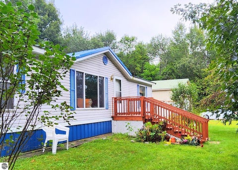 Photo of 1627 W Intermediate Lake, Central Lake, MI 49622 (MLS # 1950118)