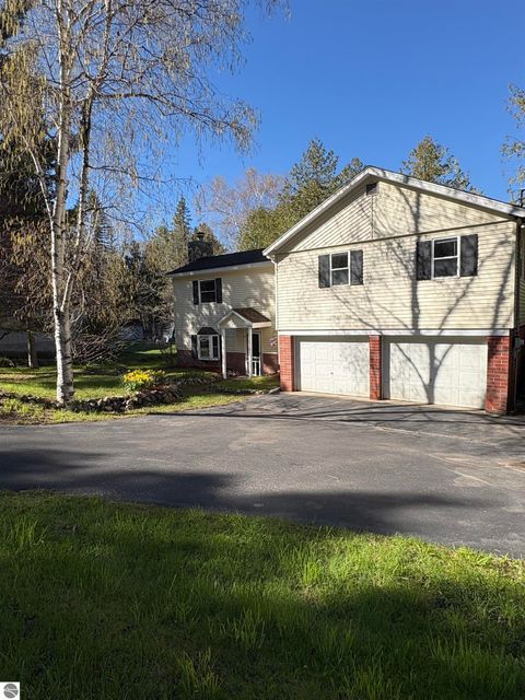Photo of 110 S Intermediate Lake, Central Lake, MI 49622 (MLS # 1945166)