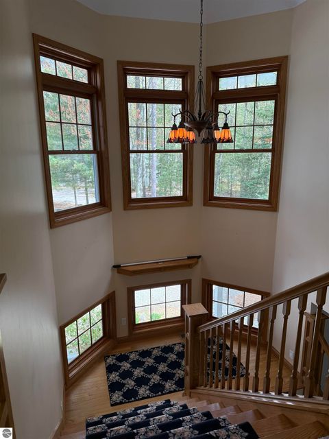Tiny photo for 410 S Golden Beach Drive, Kewadin, MI 49648 (MLS # 1933860)